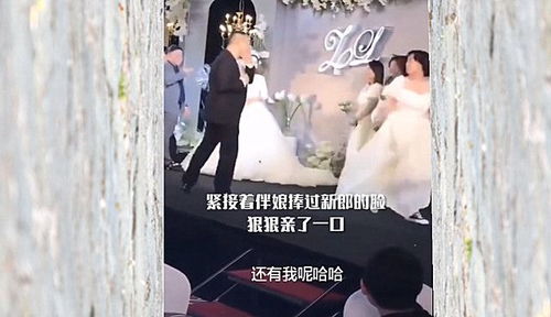 河南一伴娘婚礼上突然强吻新郎,新娘脸色大变,现场气氛尴尬不已